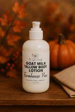 Load image into Gallery viewer, Goat milk tallow body lotion bottle with on a wooden surface with autumn leaves and a pumpkin in the background.